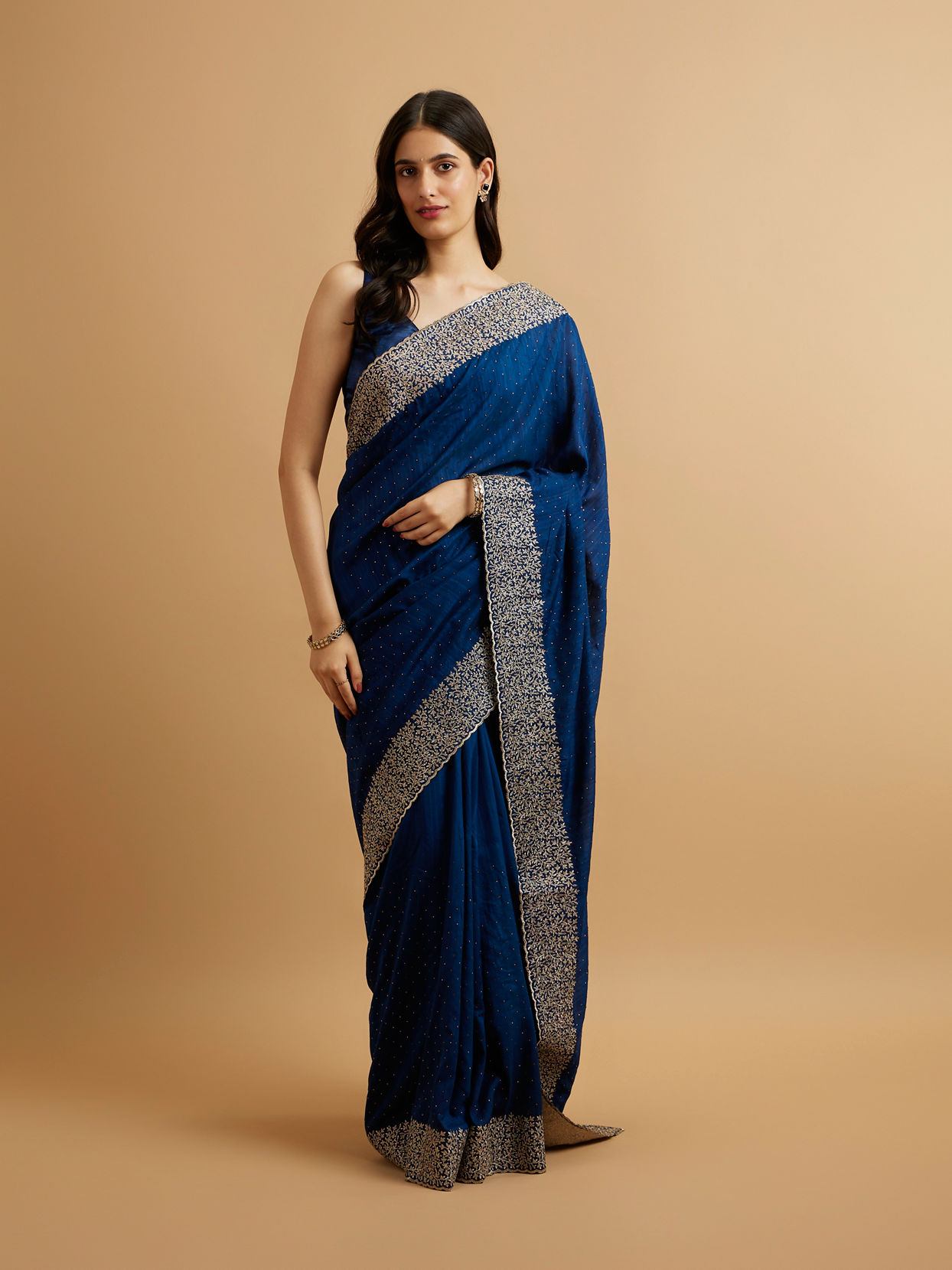 alt message - Mohey Women Indigo Blue Bel Buti Patterned Saree with Stone Embellishment image number 0